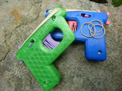 Rubber Band Gun with Selectable Modes