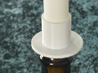 Candle holder for bottle