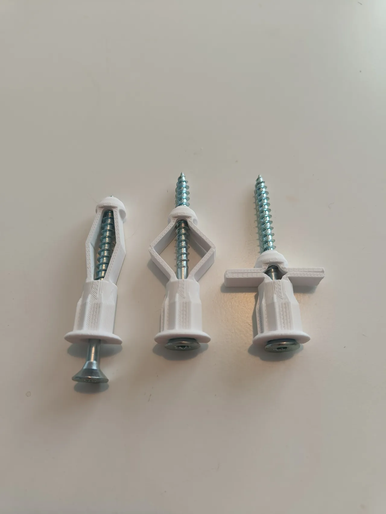 Drywall anchor with opening wings view 3