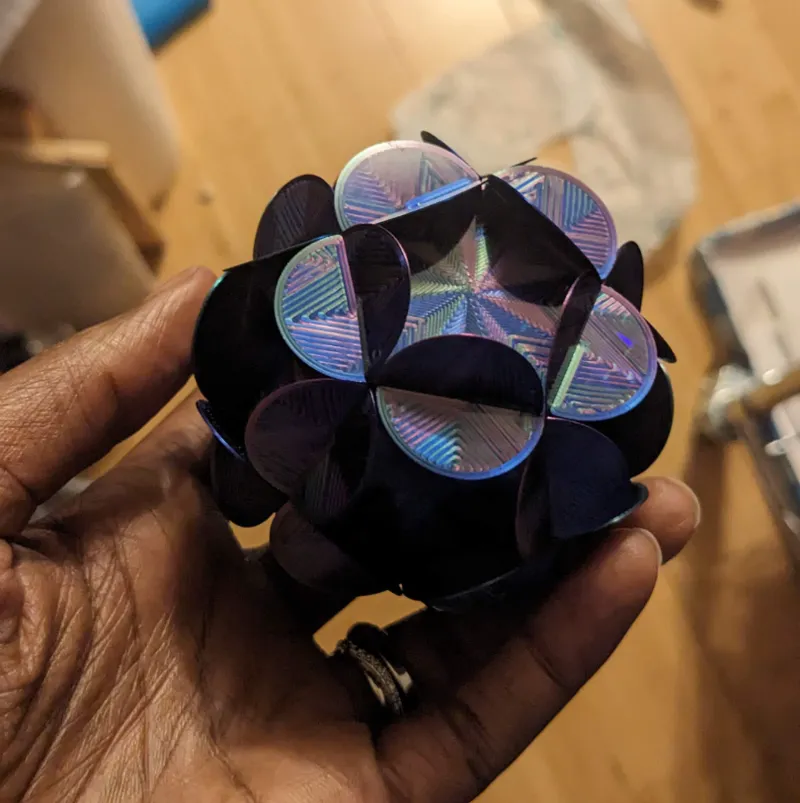 Slide together geometric flower ball ornament