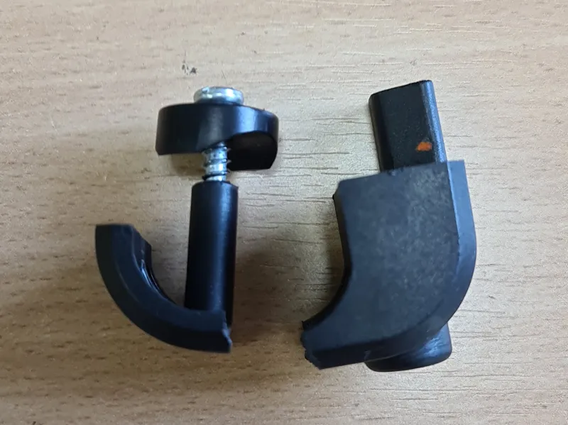 A fragment of a lawnmower handle
