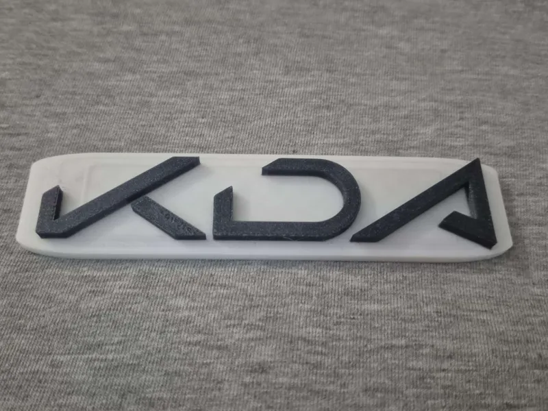 K/DA Logo Trinket
