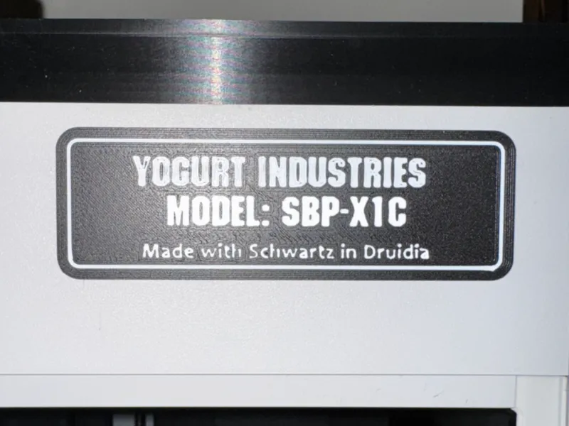Spaceballs "Yogurt Industries" X1C Printer badge. 