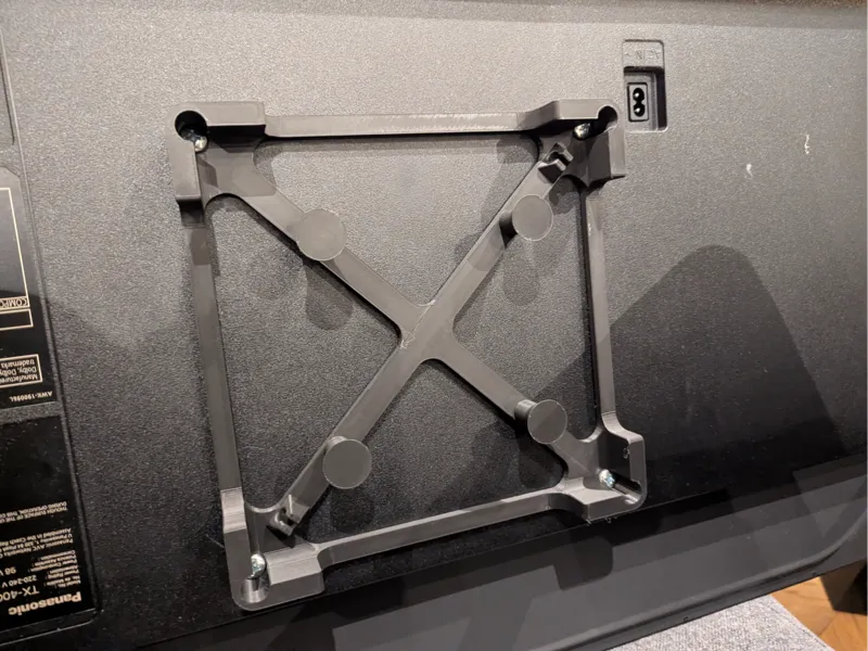 Low-Profile VESA TV Riser + Cable Wrap (200×200)