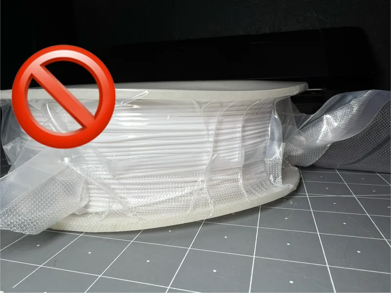 Vacuum pack "anti-crush ring" for spools