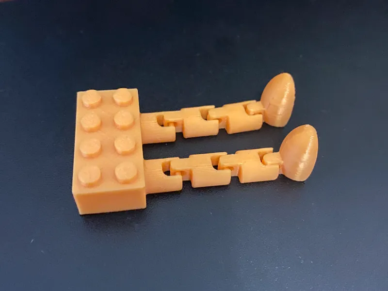 Articulated Stackable Brick Buddy (2x4)