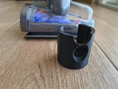 Dyson attachment holder