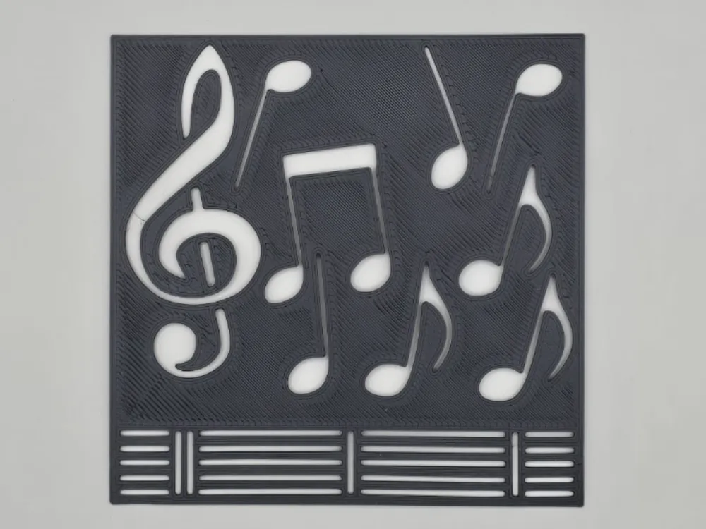 Letrero o emblema decorativo: Treble Clef Flying Notes Stencil. Referencia del modelo original.