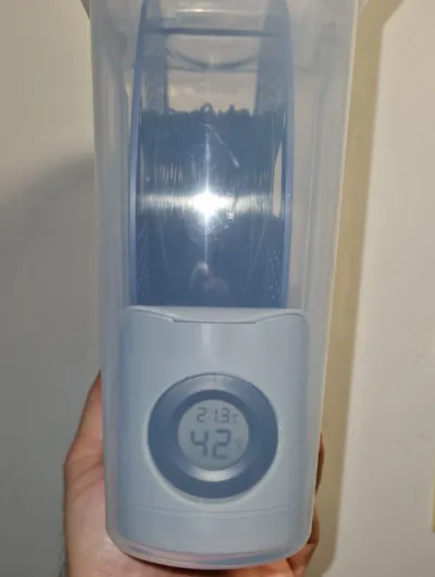 spool holder for airtight container