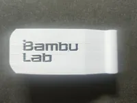 Colored text with 2 addional pieces for purged material