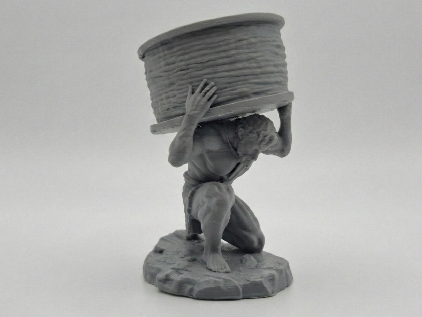 Atlas Carrying a Filament Spool