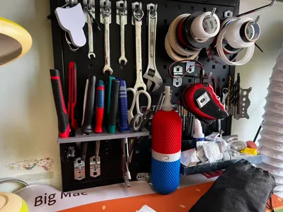 Square pegboard pliers holder