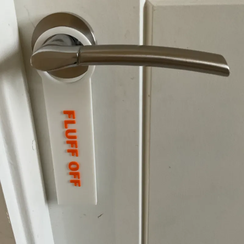 Fluff off door sign
