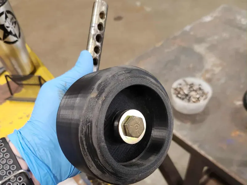 Lawn tractor/mower deck wheel