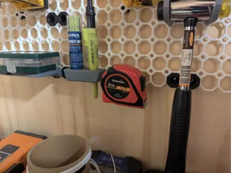 Tape measure holder for Multiboard