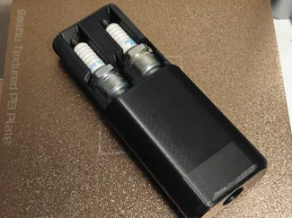 Spark plug case/holder for two spark plugs