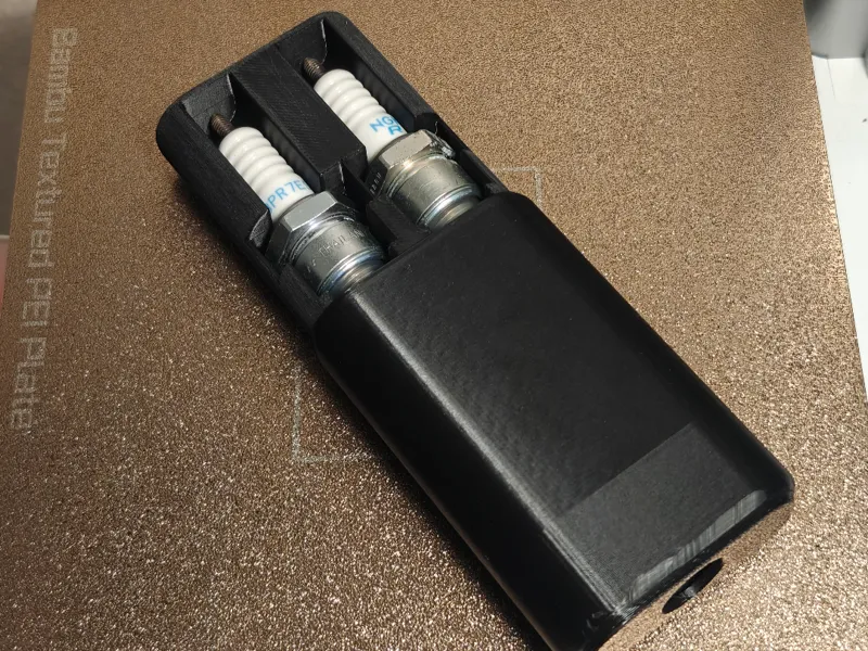 Spark plug case/holder for two spark plugs