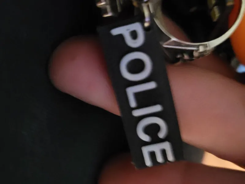 Tiny Police keychain 1 color change, under 2 grams
