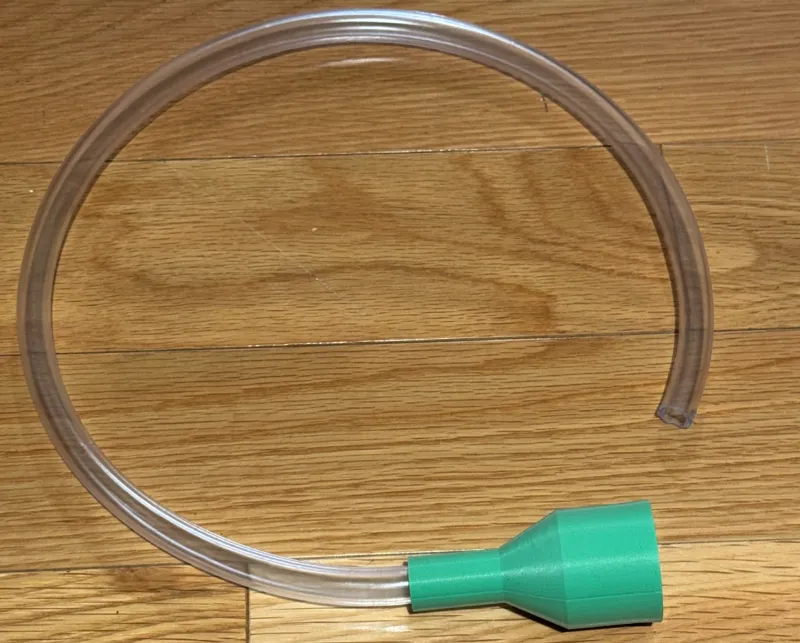 Lint trap vacuum adapter