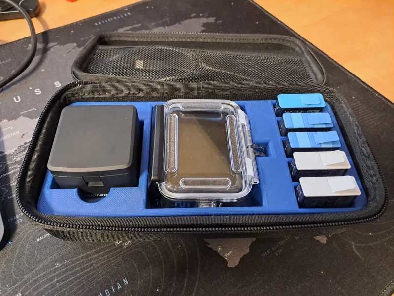 Gopro inlay for 5 batteries, 1 charging unit Coolshow, and one protective case 