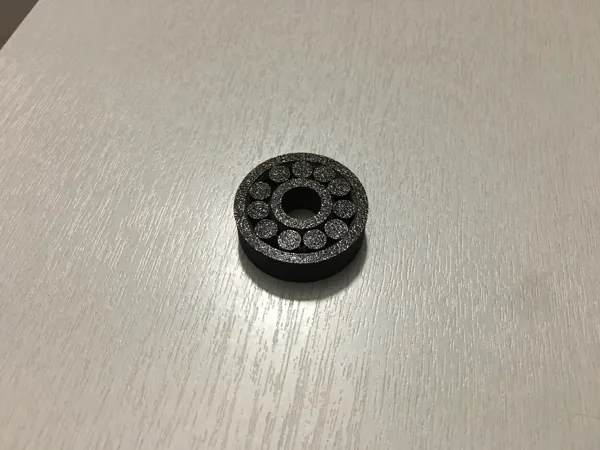 Roulement à billes imprimé en une pièce
