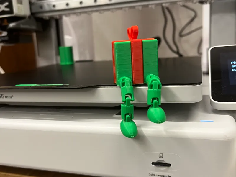 Articulated Christmas present with legs
