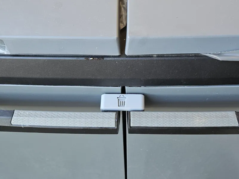 Blocca porta per cestino rifiuti