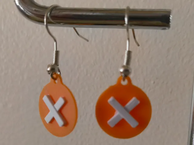 boucle d'oreille logo annuler