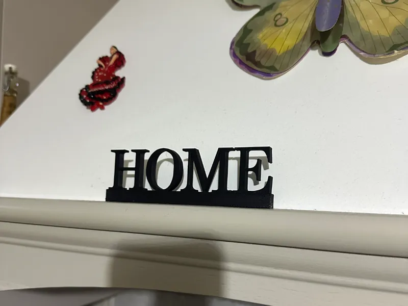 Home scritta ornamentale