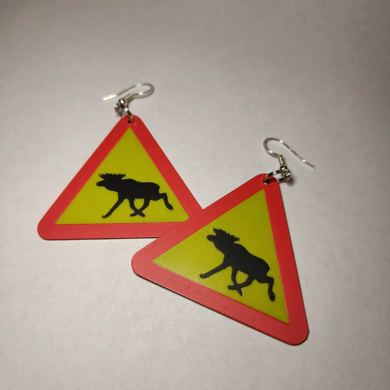 Warning for the swedish moose earrings/keychain view 2