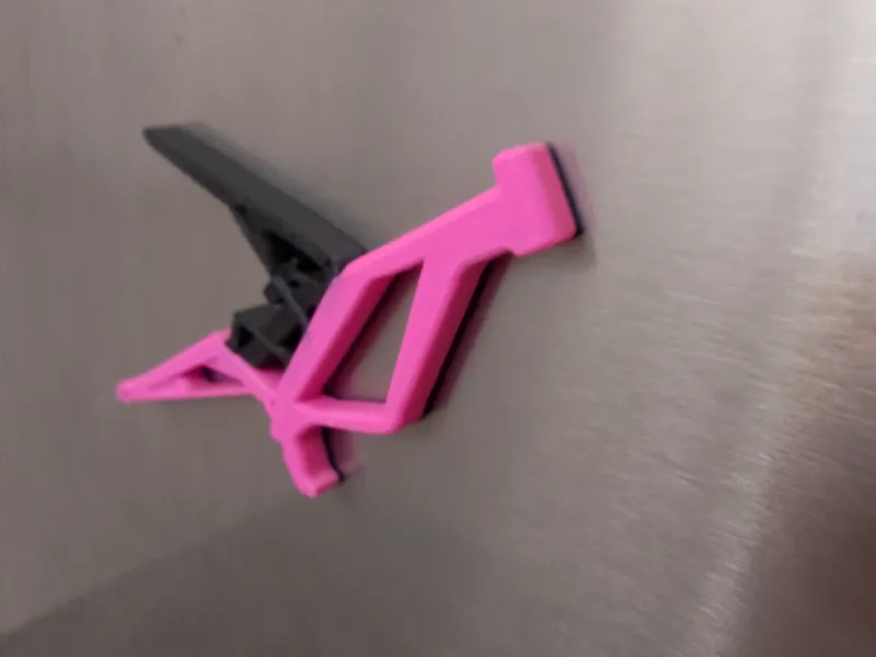 Surron, magnet/keychain