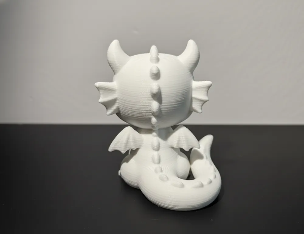 Cute Baby Dragon Figurine - Free 3D Print Model - MakerWorld