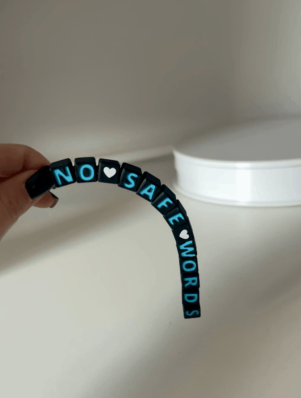 Articulated NO SAFE WORDS keychain LIGHTS OUT