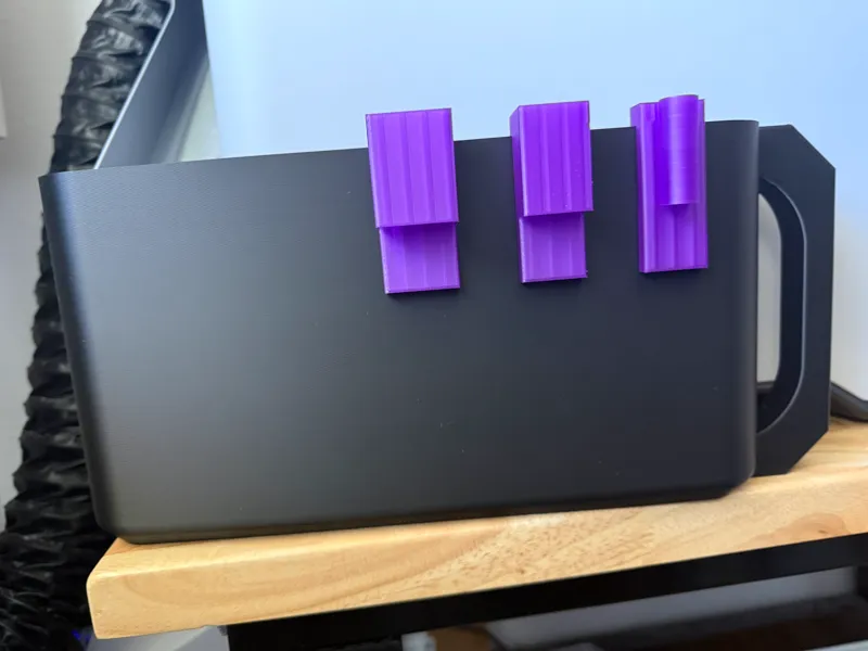 Tool holders clips onto 'poop' bin