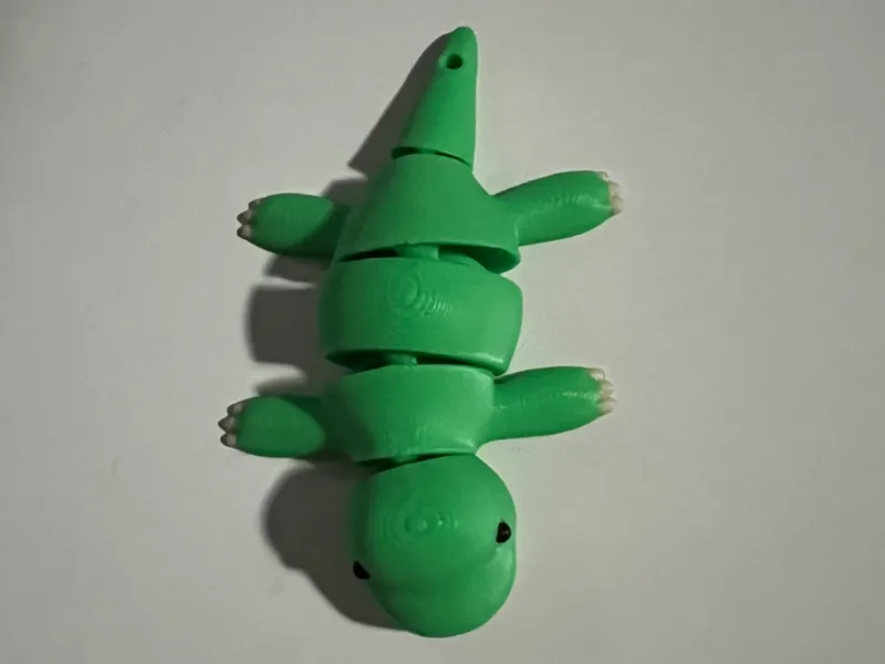 Articulated T-rex keychain