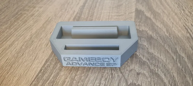 Gameboy Advance SP stand with 1 game