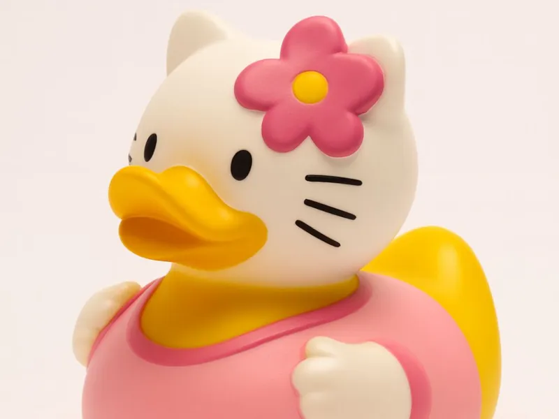 Cute Duck Figurine with Bow and Flower