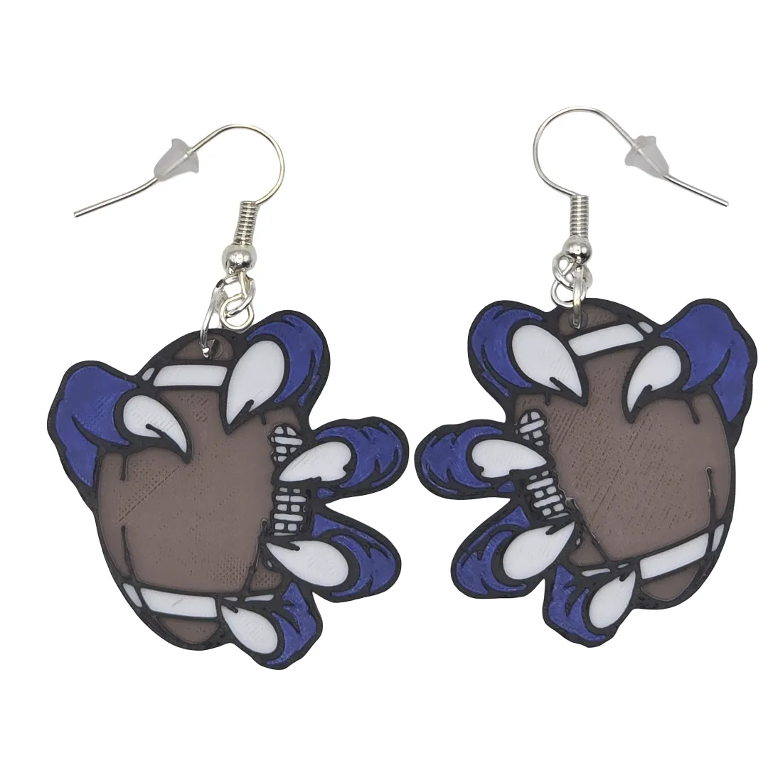 Monster claw holding football earrings view 3