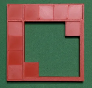 11 Unit squares packing puzzle
