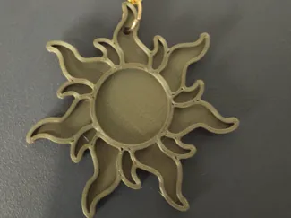 chaveiro sol da rapunzel