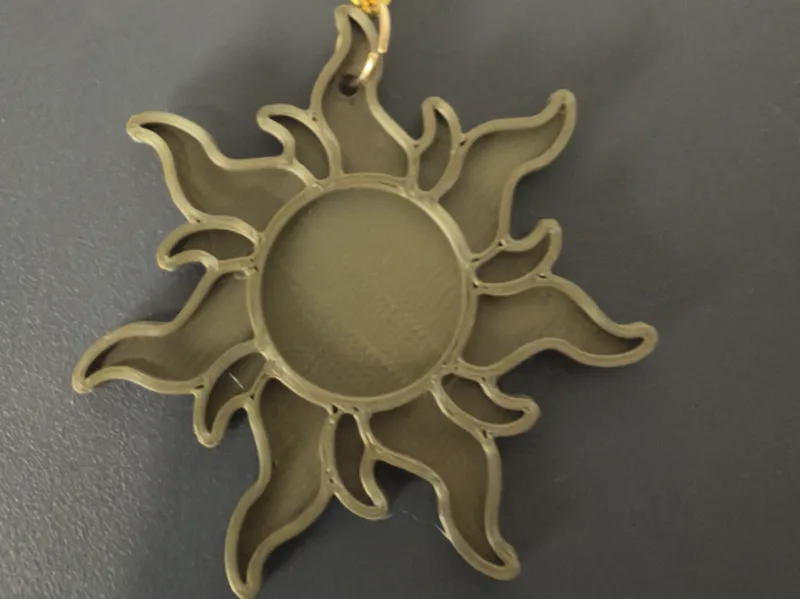 chaveiro sol da rapunzel