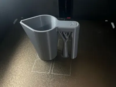 Measuring cup with handle and 10, 20, 30, 40, 50ml scale