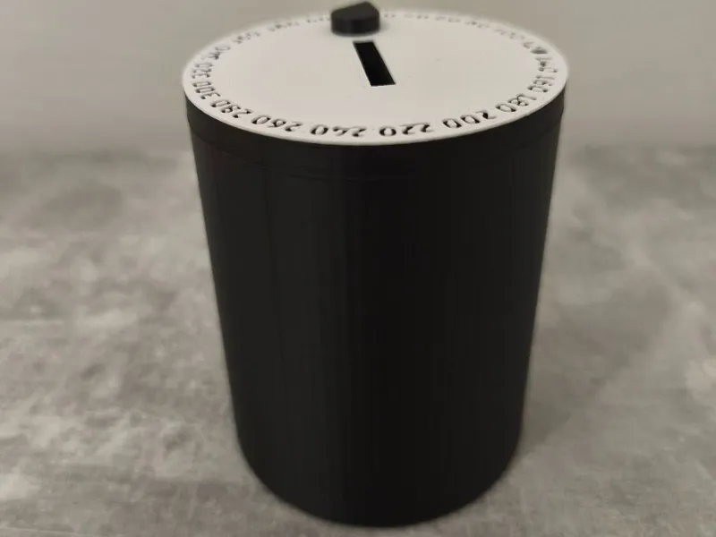 Piggy bank with a sliding counter