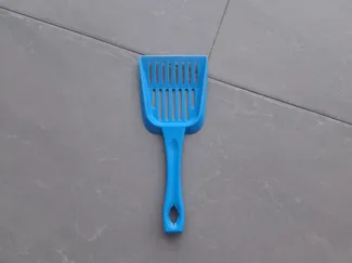 Pala para arenero de gatos