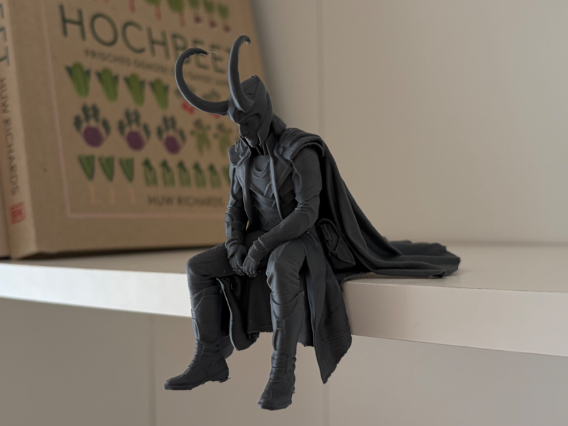 Loki Sitting on Shelf Figure
