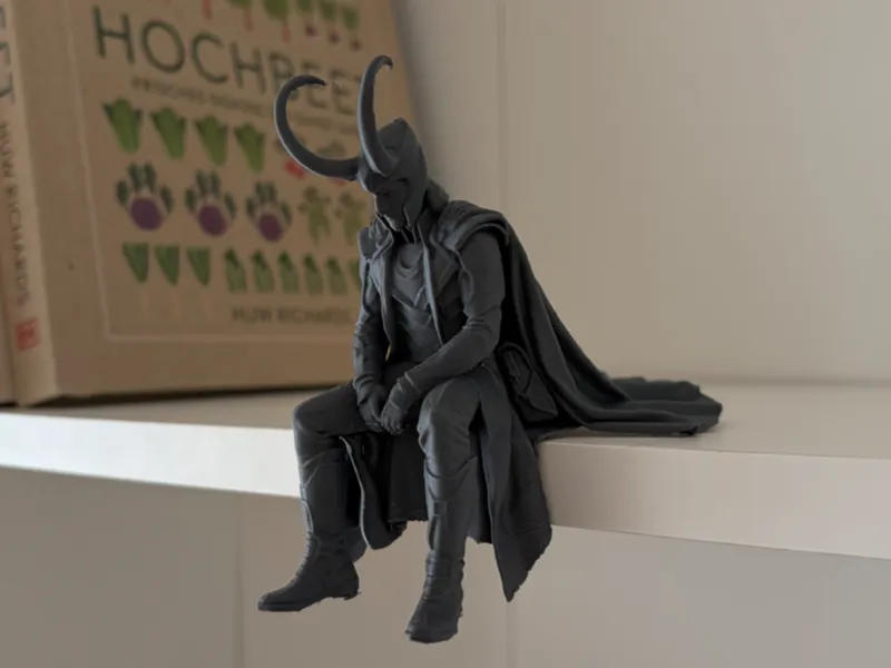 Loki Sitting on Shelf Figure