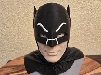 Adam West as Batman