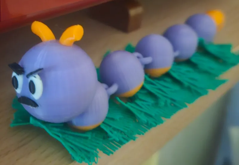 Articulated Angry Caterpillar and Leaf stand