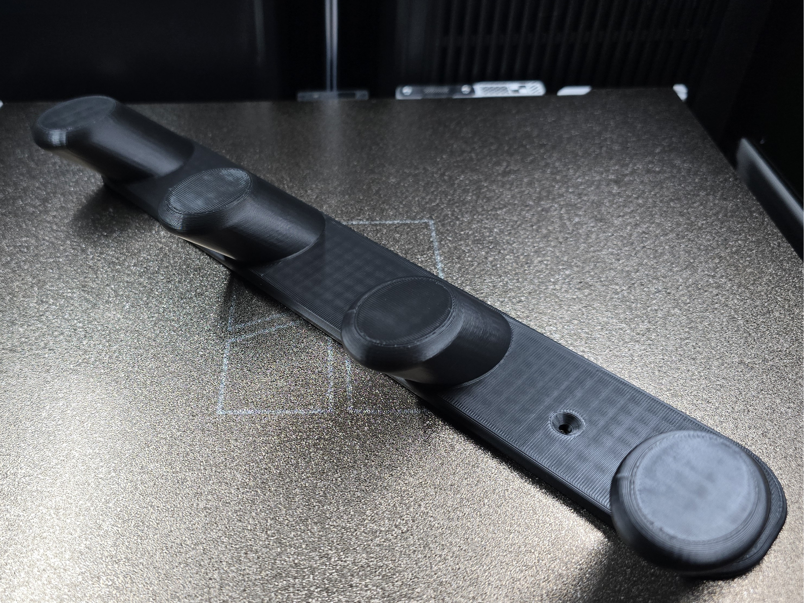 Staubsaugerdüsenwandhalter