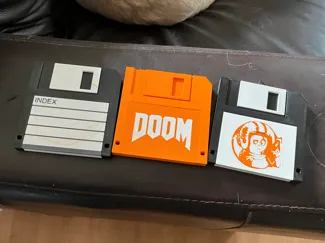 Floppy disk coasters with interchangable labels